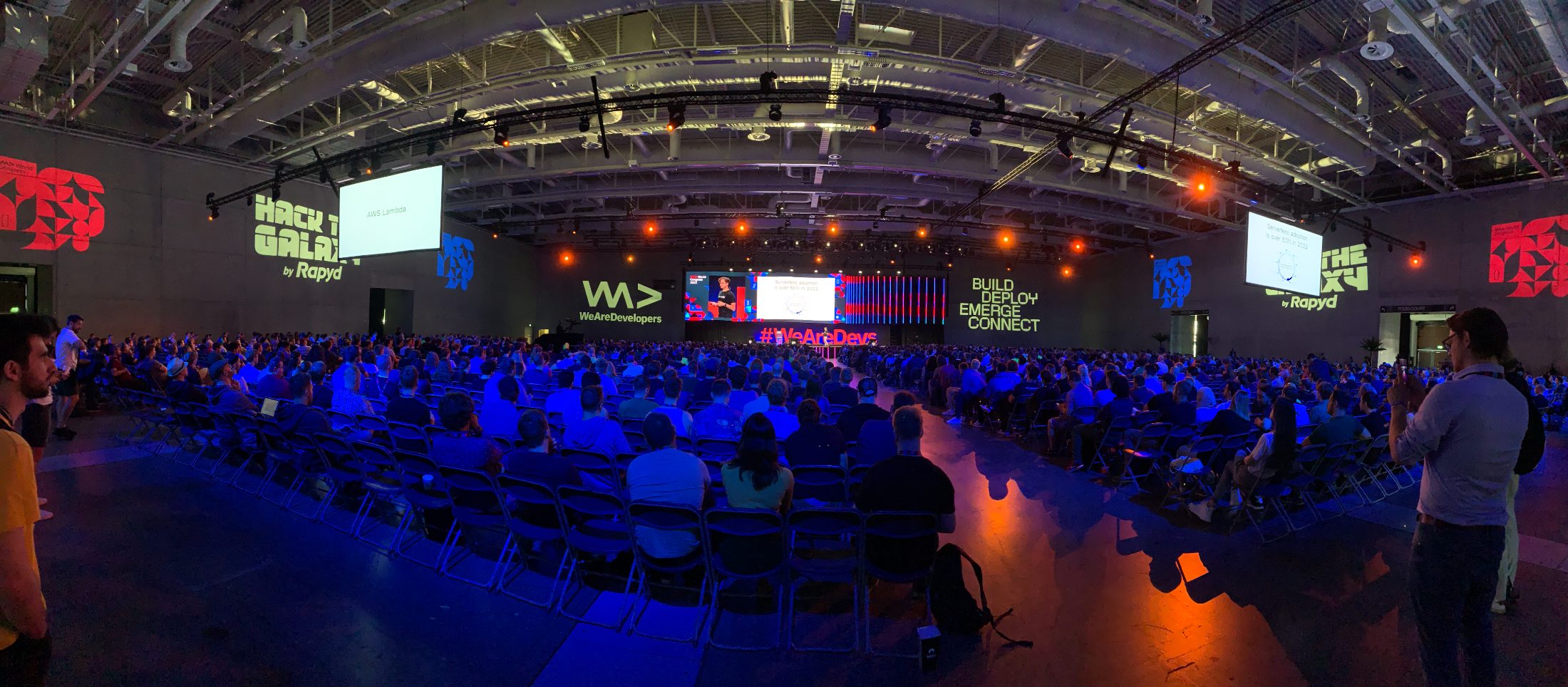 Optiveum team in discussion at a tech conference